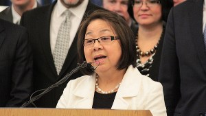 Shoubee Liaw introduces Gov. Jay Inslee, April 29, 2014, at an event in the college Professional Automotive Training Center to announce his Carbon Emission Reduction Task Force.