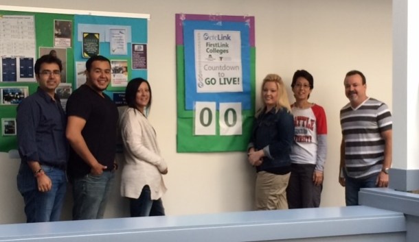 No days 'til go live! The Financial Aid Team pulled a couple all-nighters Cutover Weekend and they were still up for a photo shoot. From Left: Neeraj Kripalani, Ciber; Luis(Tony) Rivera, Ciber; Jodi Sharpe, SBCTC; Kim Wasierski, SBCTC; Jerry Perez, Ciber. 