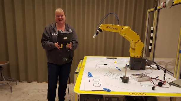 wanda-waldrop-operating-robotic-arm-in-the-manufacturing-department