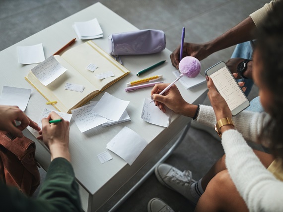 student group work being done at a table
