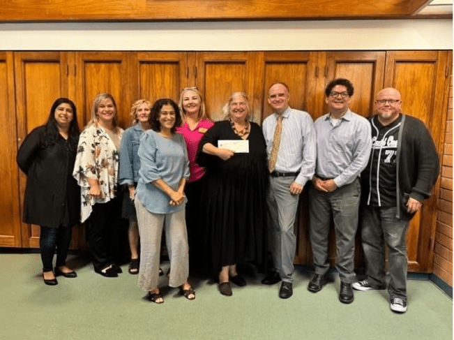 Photo of college staff along with staff from Coastal Community Bank.