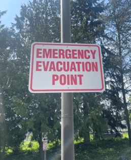 Emergency Evacuation Point sign.