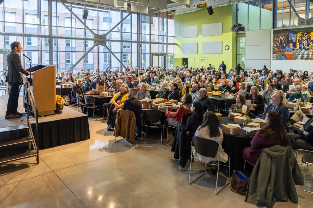 Governor Ferguson on stage addressing the audience.